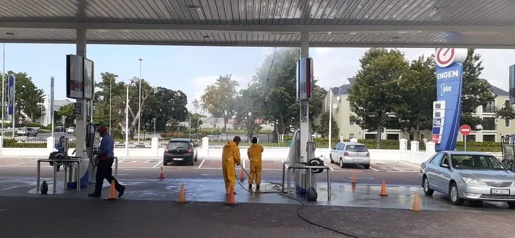 Image of Haztech Contract Cleaning employees cleaning an indistrial area.